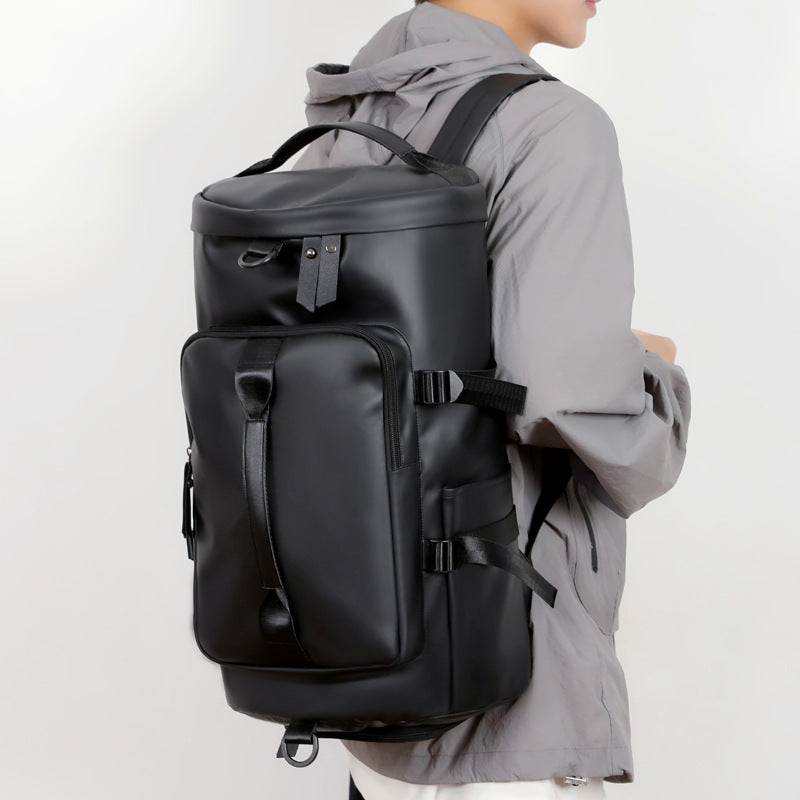 3-in-1 duffel backpack interior packed with laptop, books, and headphones